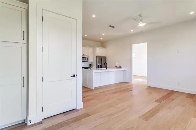 a view of kitchen with wooden floor