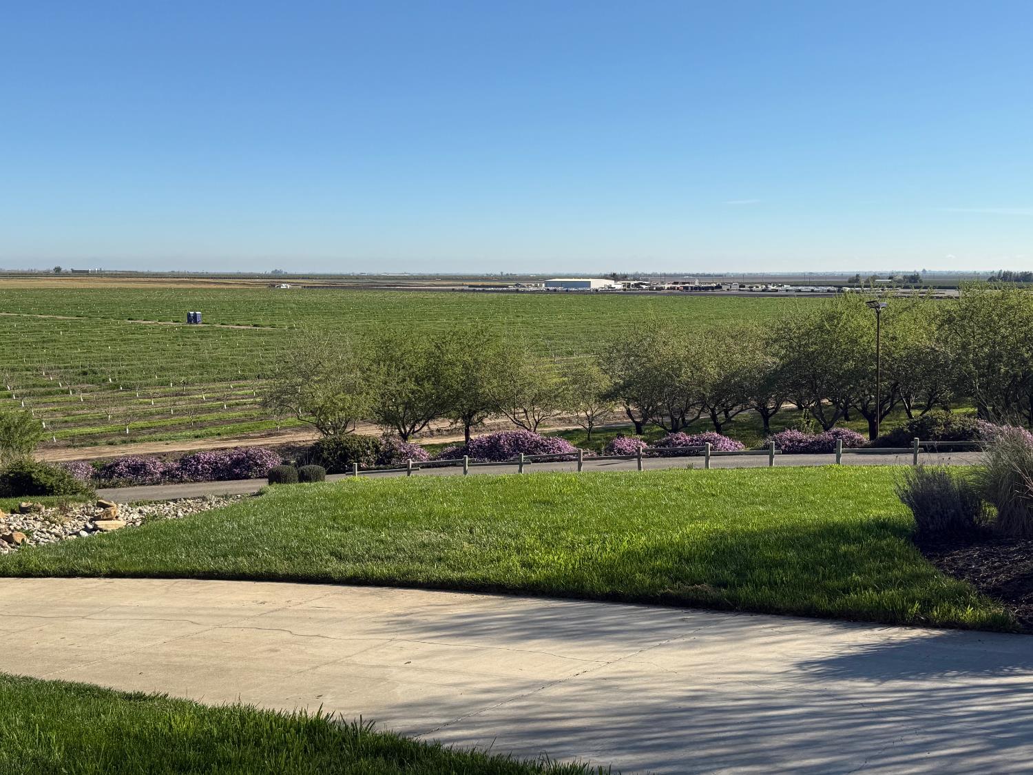 4060 Orestimba Road Newman, CA 95360 - Photo 23 of 46 a view of a garden with a building
