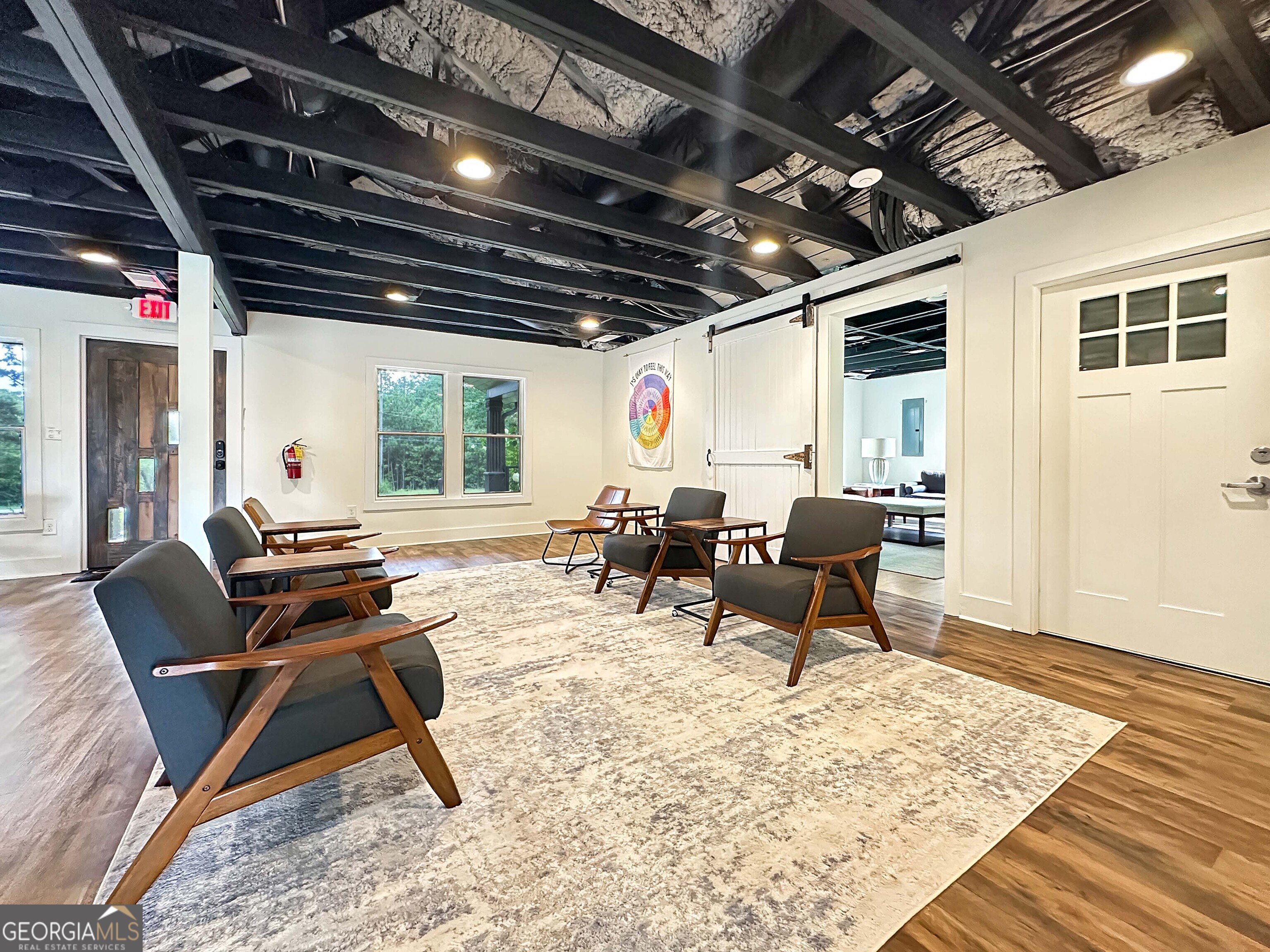 8400 Atlanta Newnan Road Chattahoochee Hills, GA 30268 - Photo 17 of 30 a living room filled with furniture