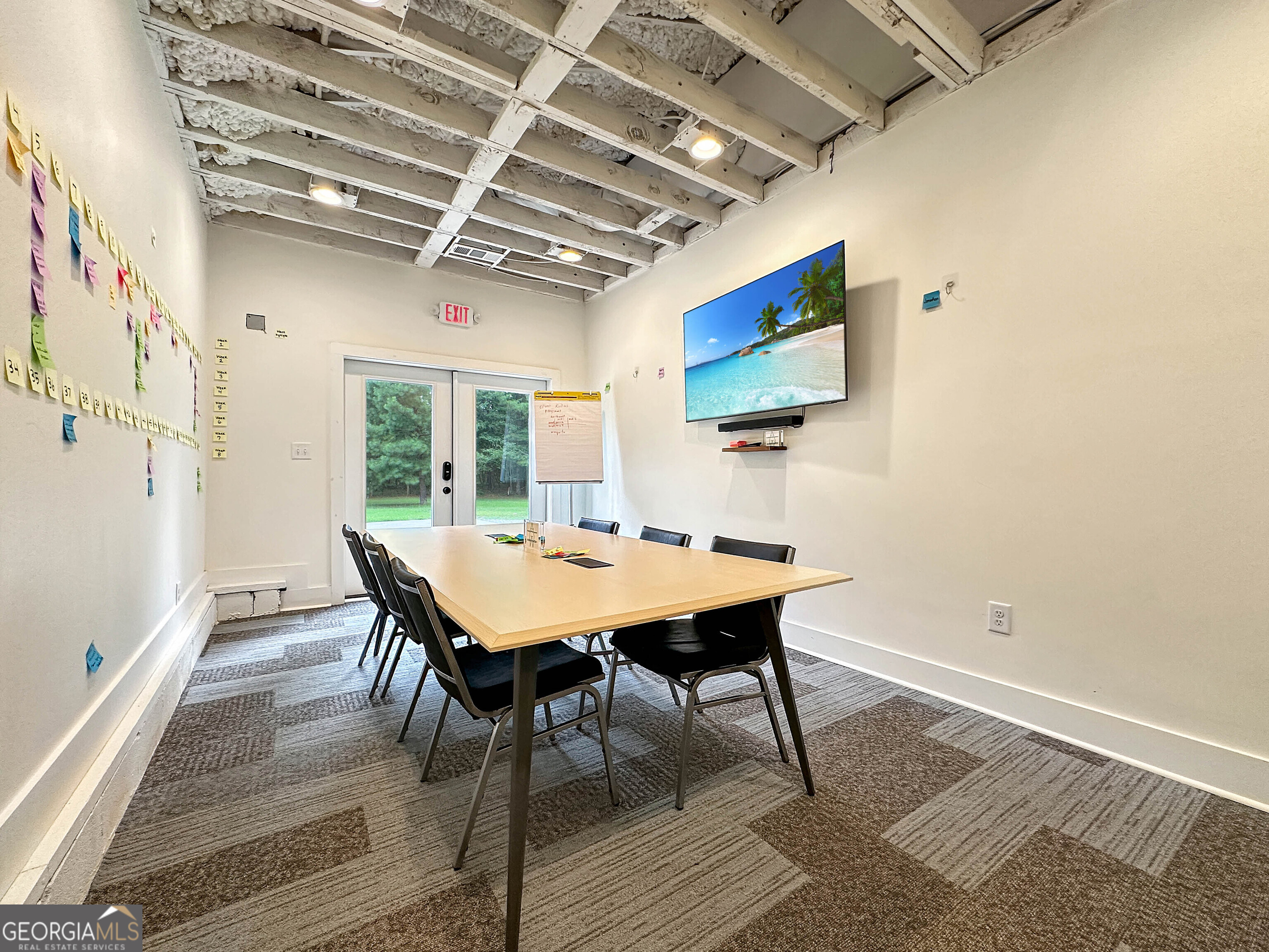 8400 Atlanta Newnan Road Chattahoochee Hills, GA 30268 - Photo 23 of 30 a view of a dining room with furniture