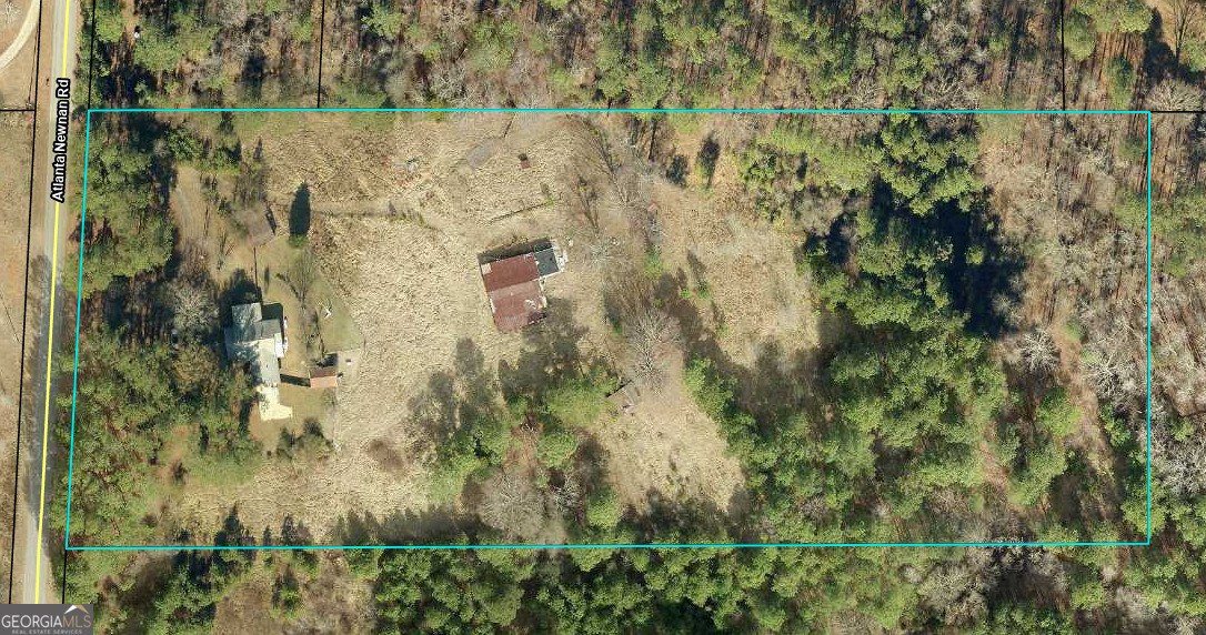 8400 Atlanta Newnan Road Chattahoochee Hills, GA 30268 - Photo 3 of 30 view of outdoor space and yard