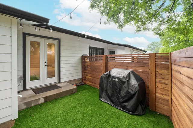 a view of a back yard of the house