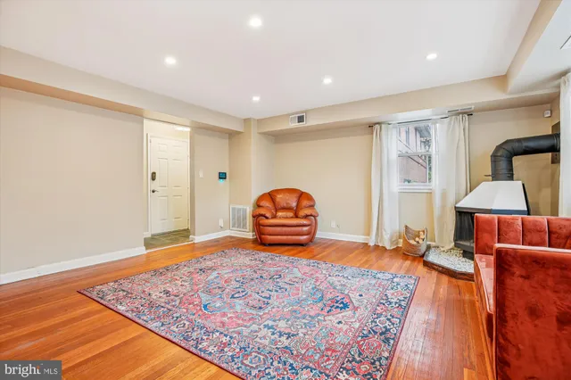 a bedroom with a bed and a lamp