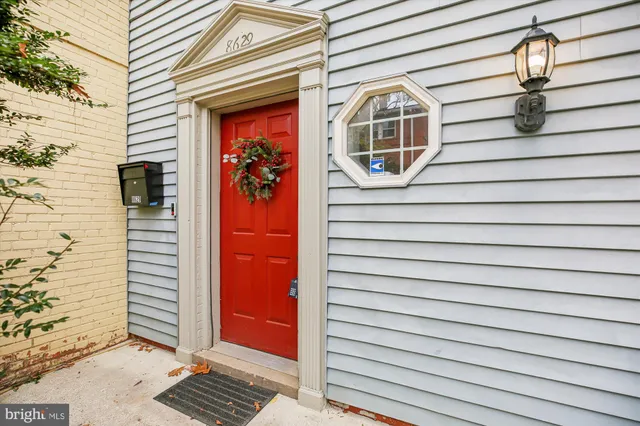 a front view of a house with a door