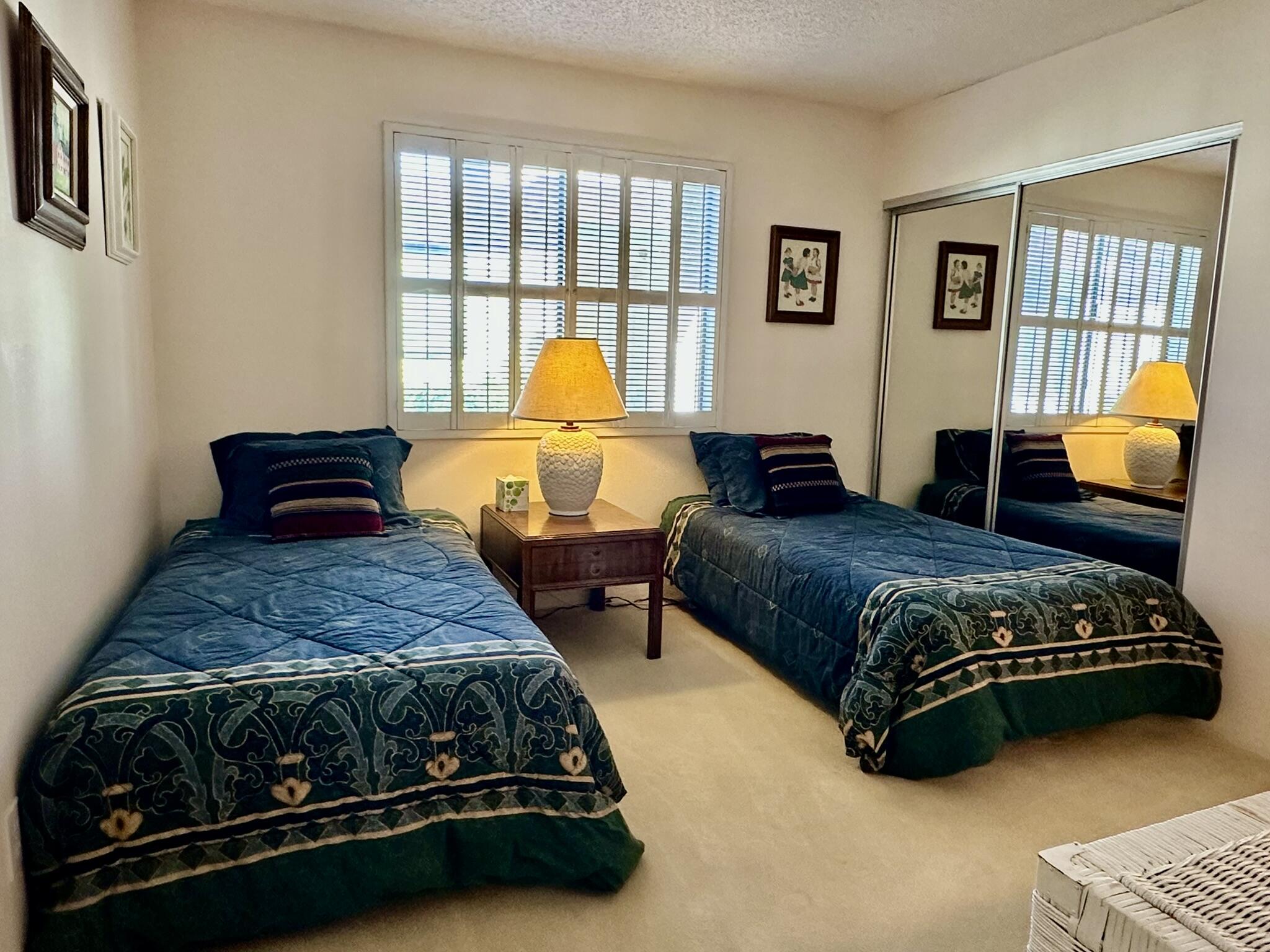 81 Marbella Drive Rancho Mirage, CA 92270 - Photo 16 of 17 a bedroom with a bed and window