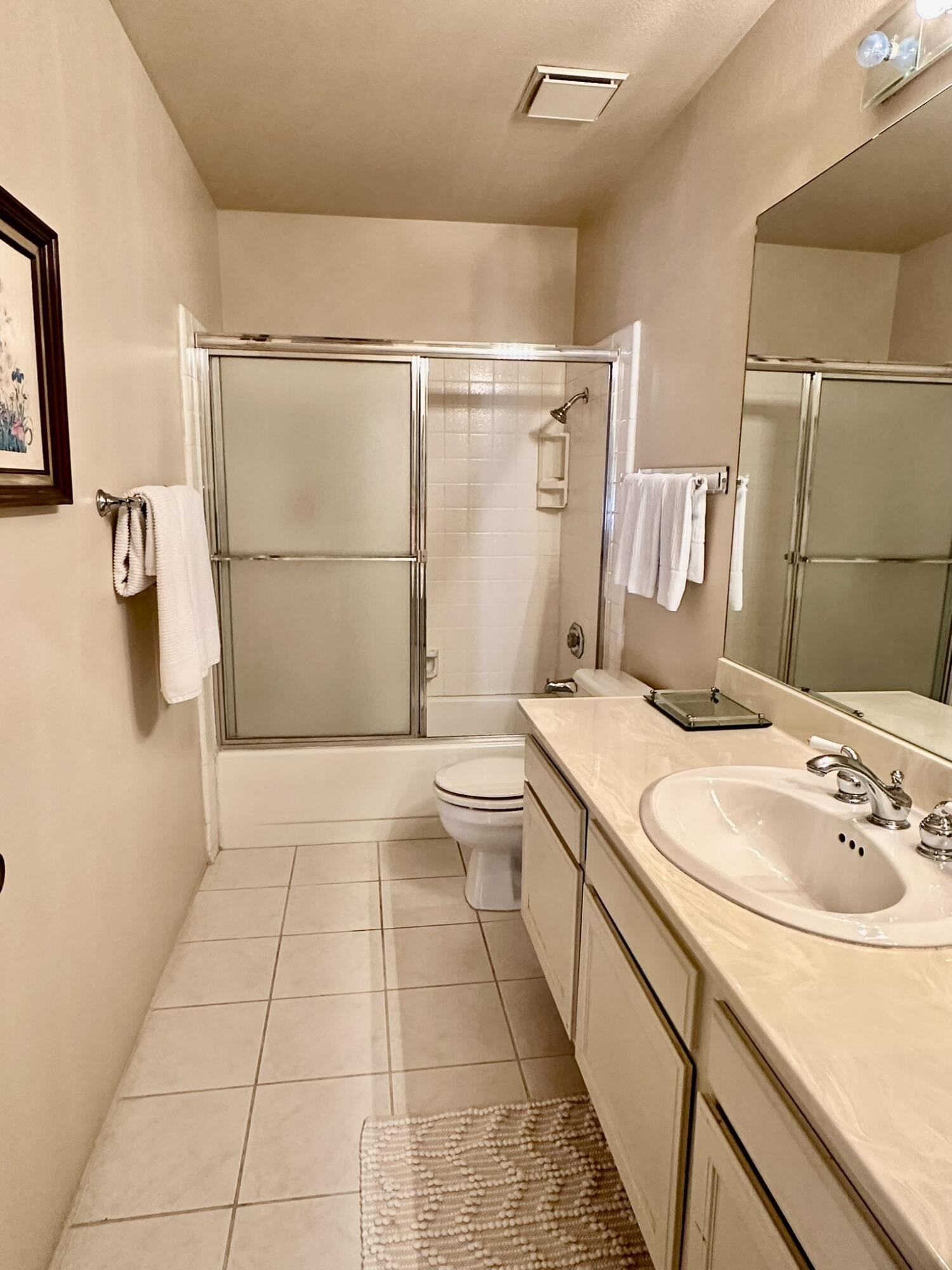 81 Marbella Drive Rancho Mirage, CA 92270 - Photo 17 of 17 a bathroom with a sink a toilet and shower