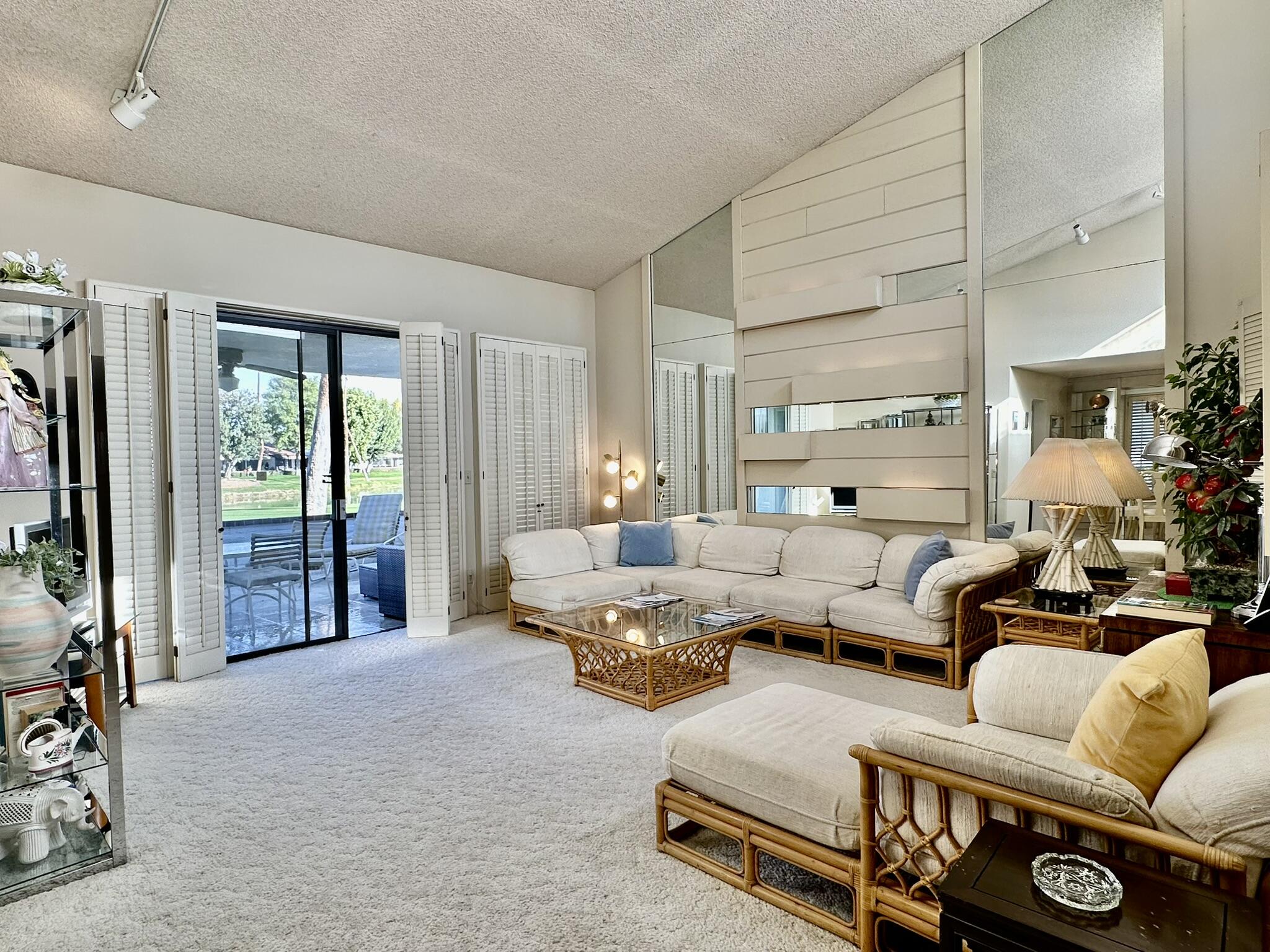 81 Marbella Drive Rancho Mirage, CA 92270 - Photo 7 of 17 a living room with furniture and a flat screen tv