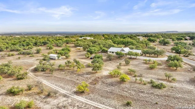 a view of a yard with an outdoor space