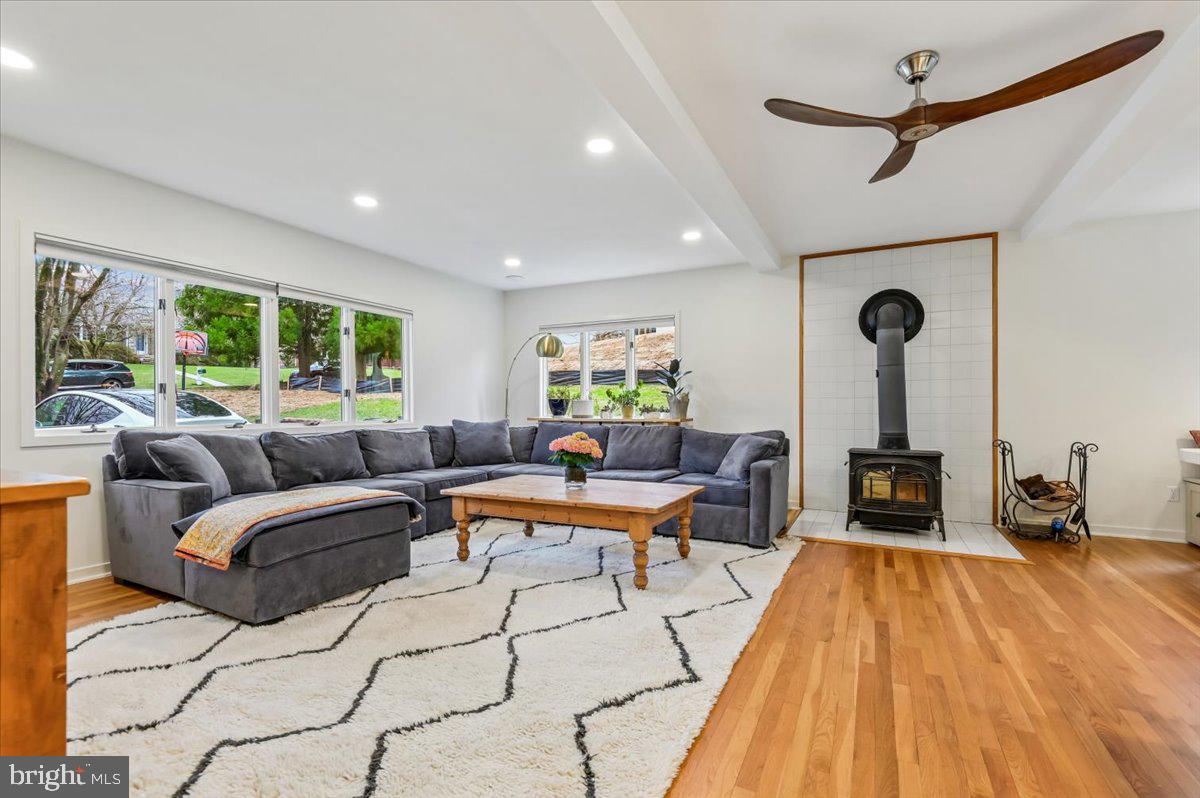 308 West Wind Road Towson, MD 21204 - Photo 9 of 80 a living room with furniture and a fireplace