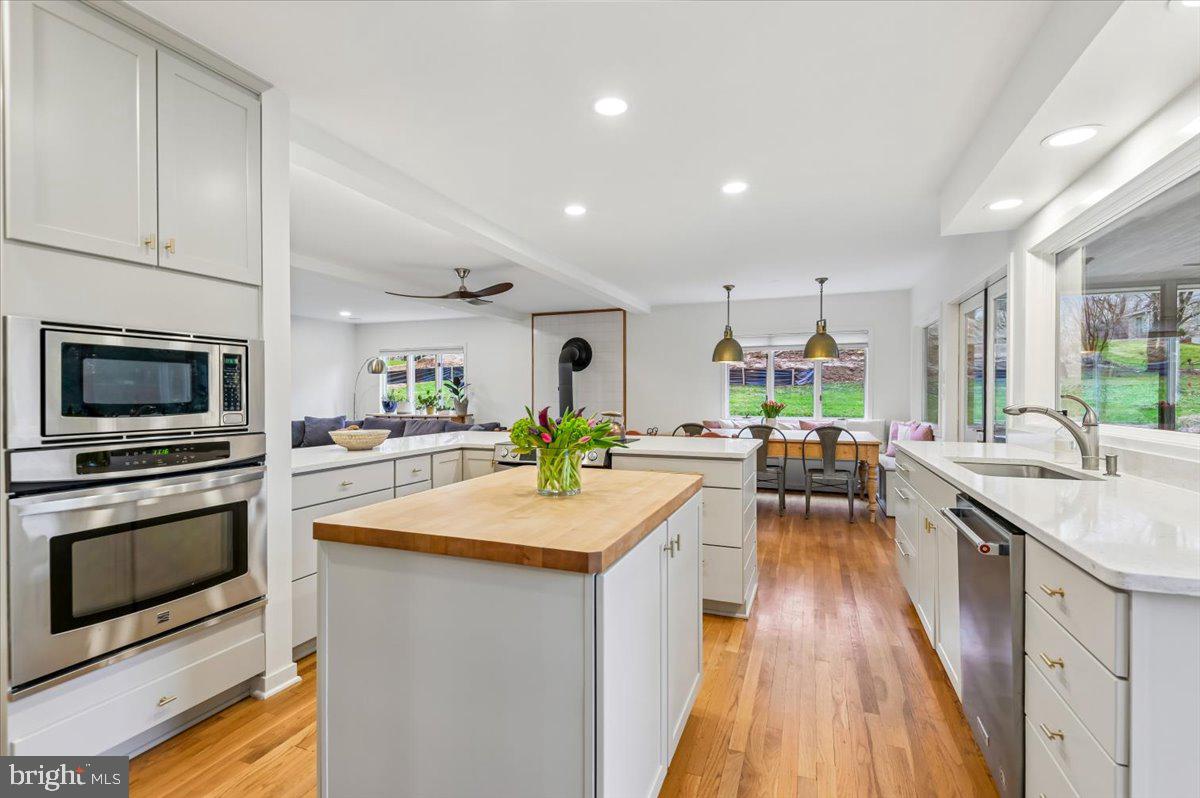 308 West Wind Road Towson, MD 21204 - Photo 20 of 80 a kitchen with a sink stainless steel appliances and counter space