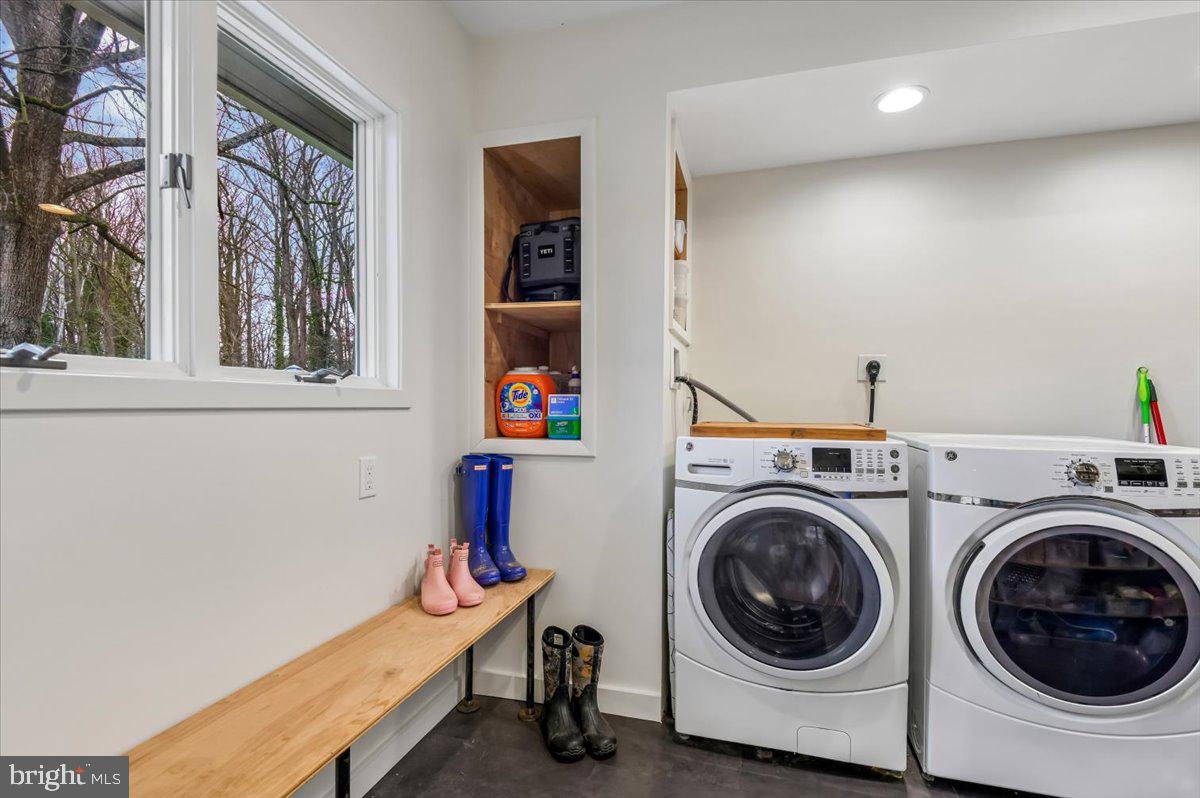 308 West Wind Road Towson, MD 21204 - Photo 23 of 80 a utility room with dryer and washer