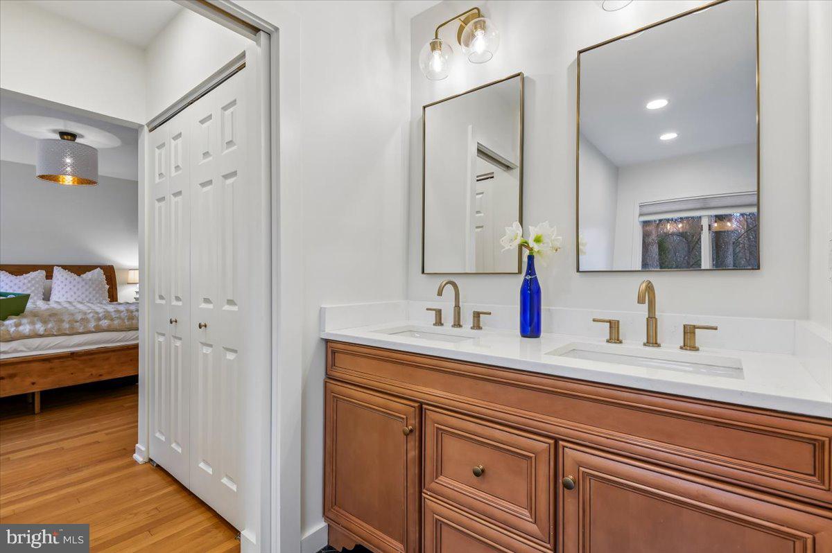 308 West Wind Road Towson, MD 21204 - Photo 30 of 80 a en suite bathroom with a sink and a mirror
