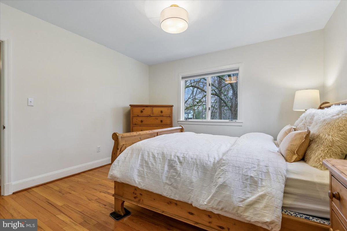 308 West Wind Road Towson, MD 21204 - Photo 37 of 80 a bedroom with a bed and a window