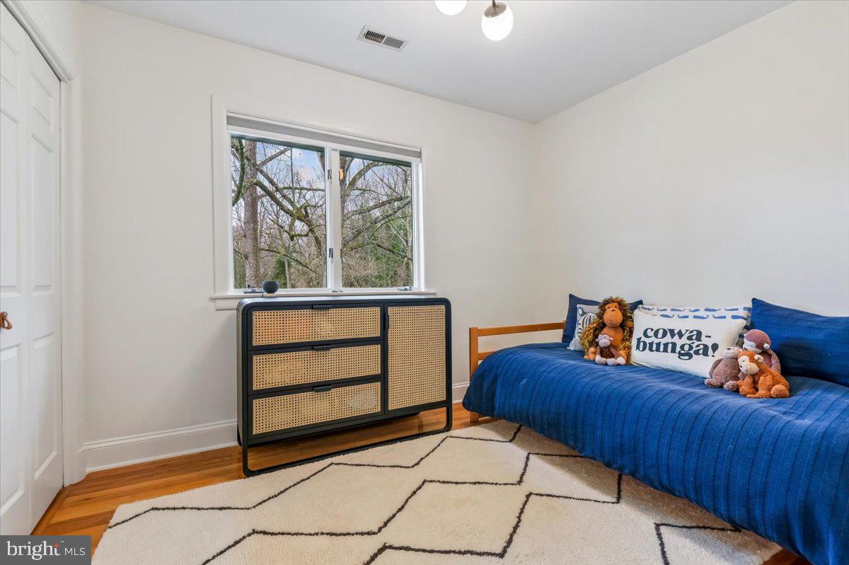 308 West Wind Road Towson, MD 21204 - Photo 39 of 80 a bedroom with a bed and a window