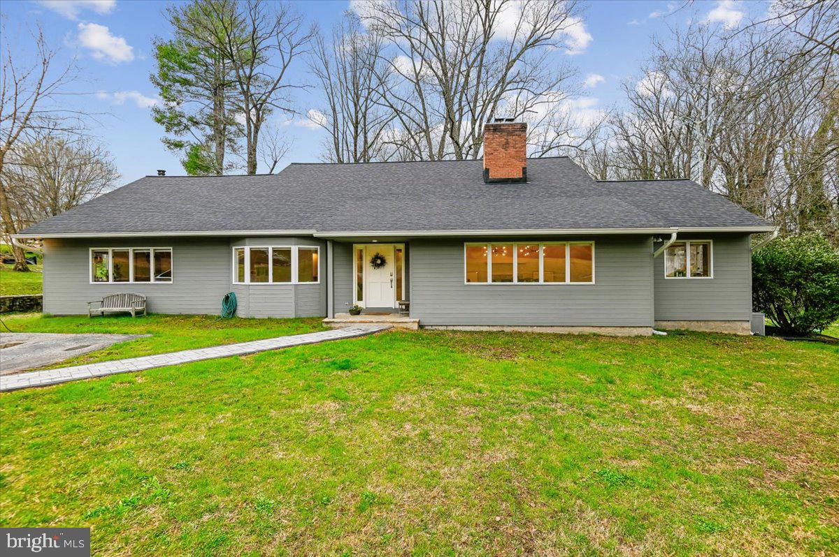 308 West Wind Road Towson, MD 21204 - Photo 57 of 80 a view of a house with a backyard
