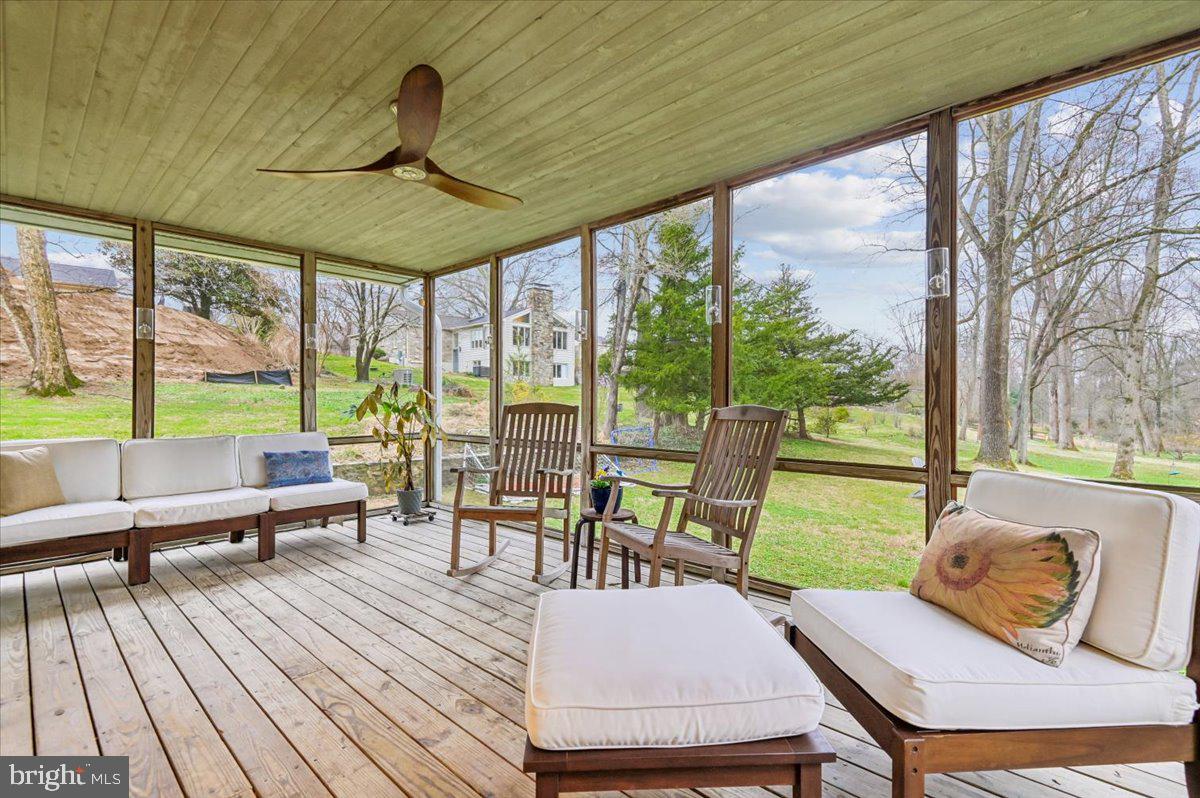 308 West Wind Road Towson, MD 21204 - Photo 58 of 80 a outdoor space with furniture and wooden floor