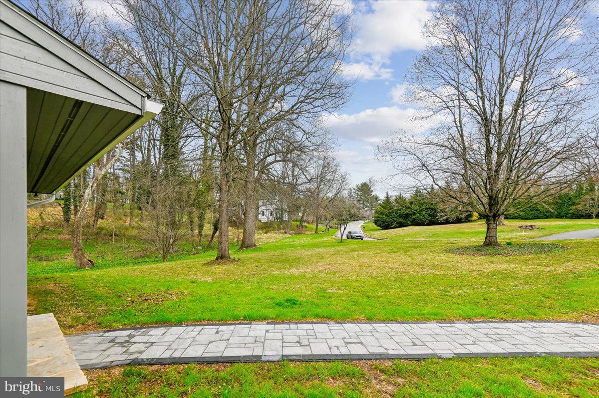 308 West Wind Road Towson, MD 21204 - Photo 66 of 80 a view of an outdoor space and a yard