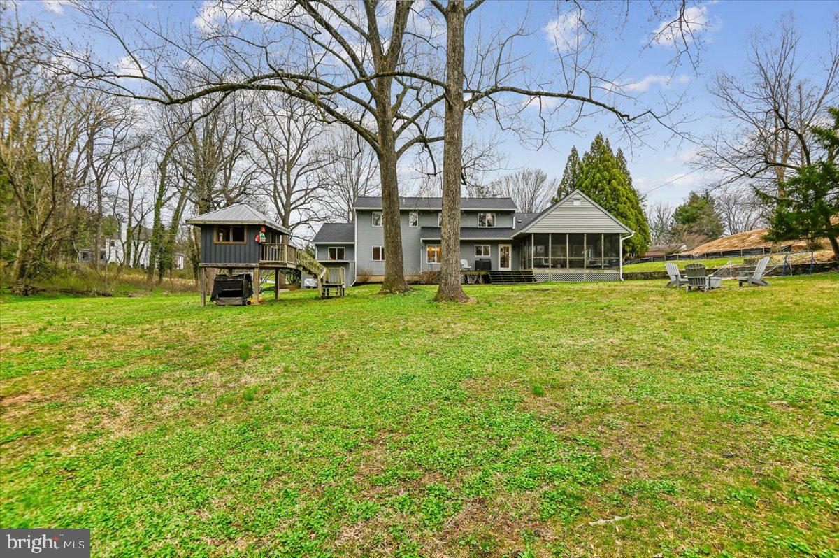 308 West Wind Road Towson, MD 21204 - Photo 68 of 80 a view of a house with a yard
