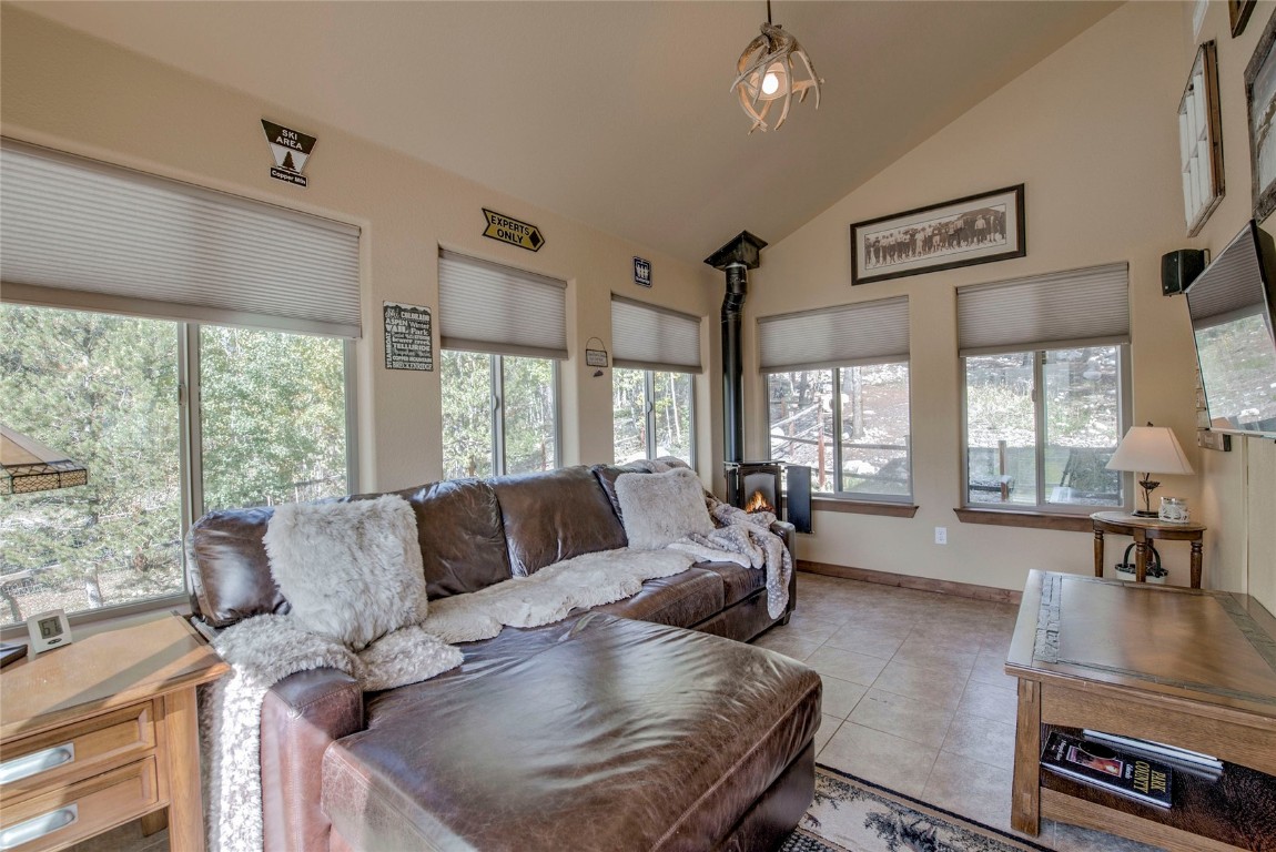 2891 Nugget Road Fairplay, CO 80440 - Photo 16 of 50 Sun room with gas woodstove