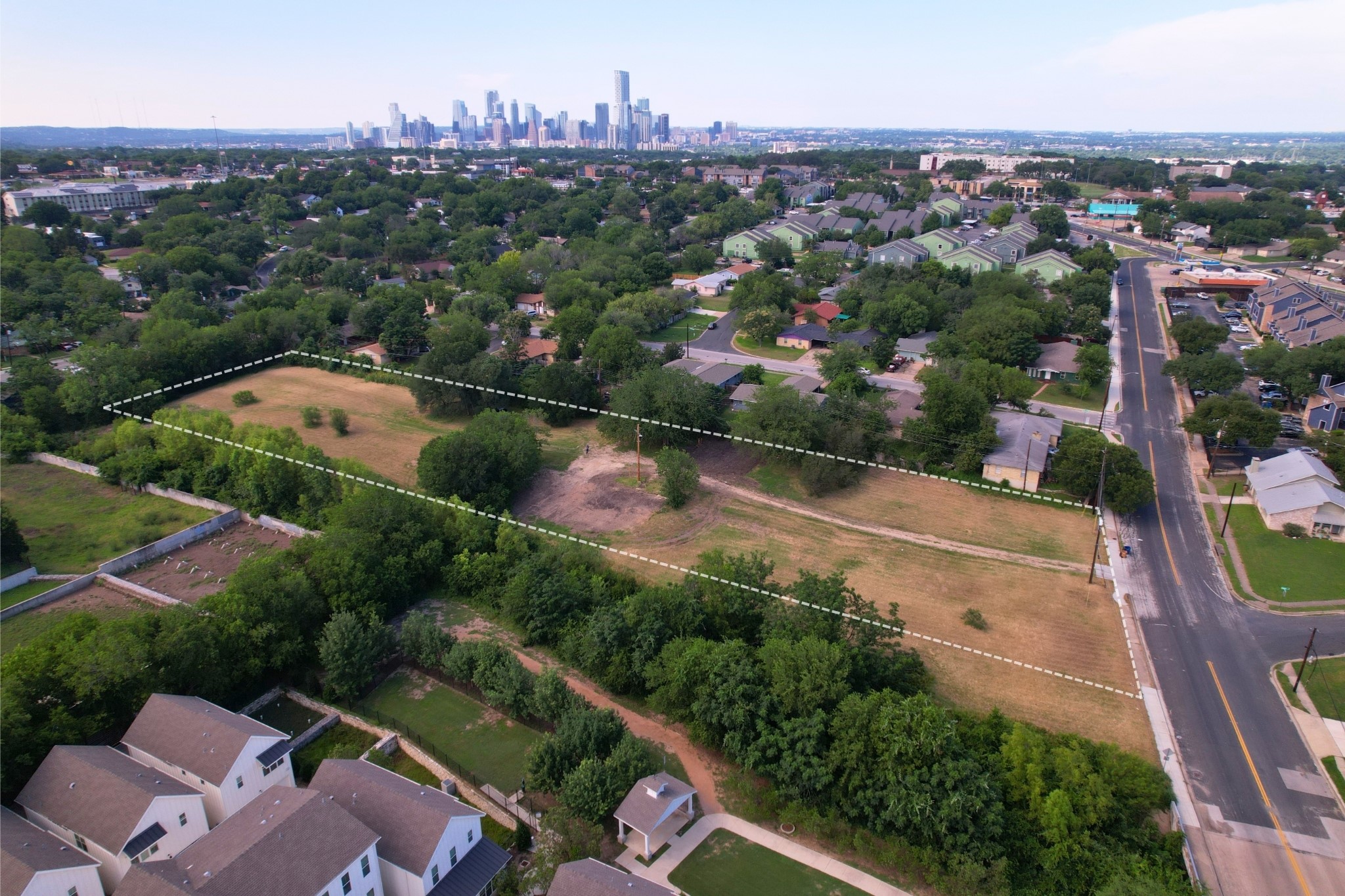 2610-2606 Metcalfe Road Austin, TX 78741 - Photo 14 of 20 A prime development opportunity with extensive acreage and a clear view of the vibrant city skyline.