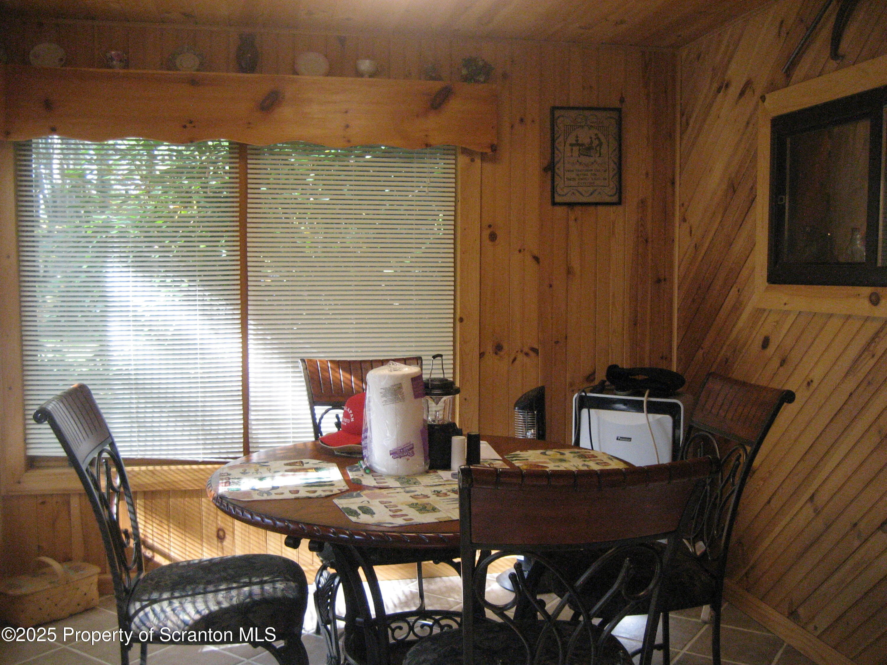 1526 Lakeview Road Susquehanna, PA 18847 - Photo 17 of 31 a view of a balcony dining table and chairs