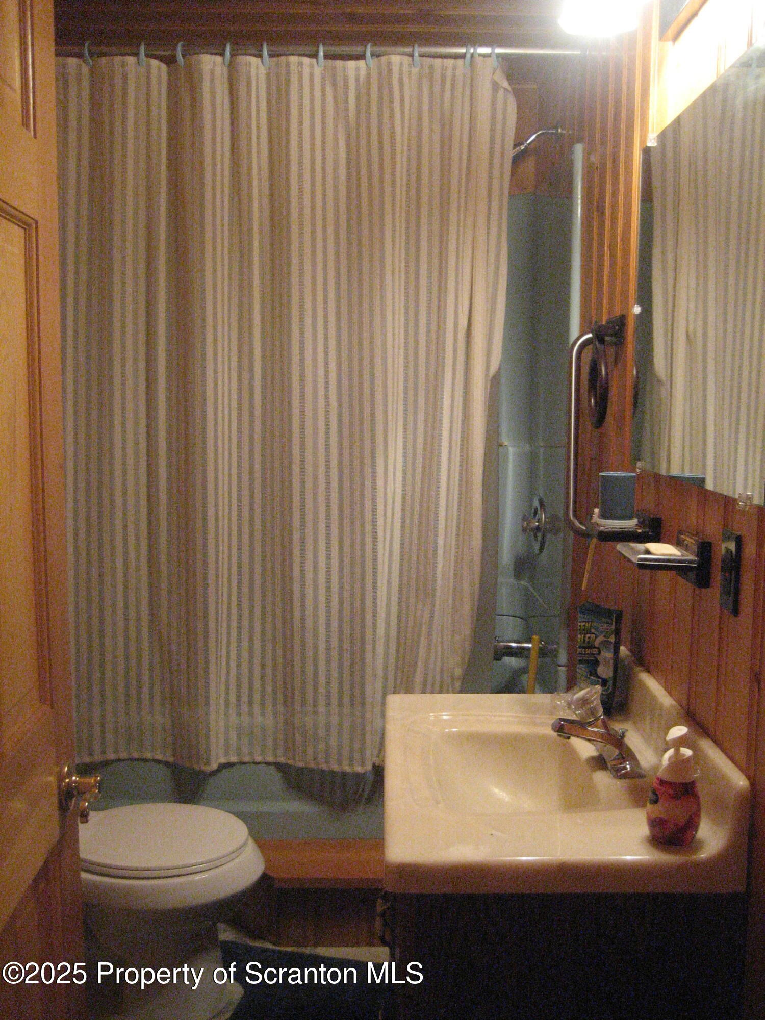 1526 Lakeview Road Susquehanna, PA 18847 - Photo 19 of 31 a bathroom with a sink and a mirror
