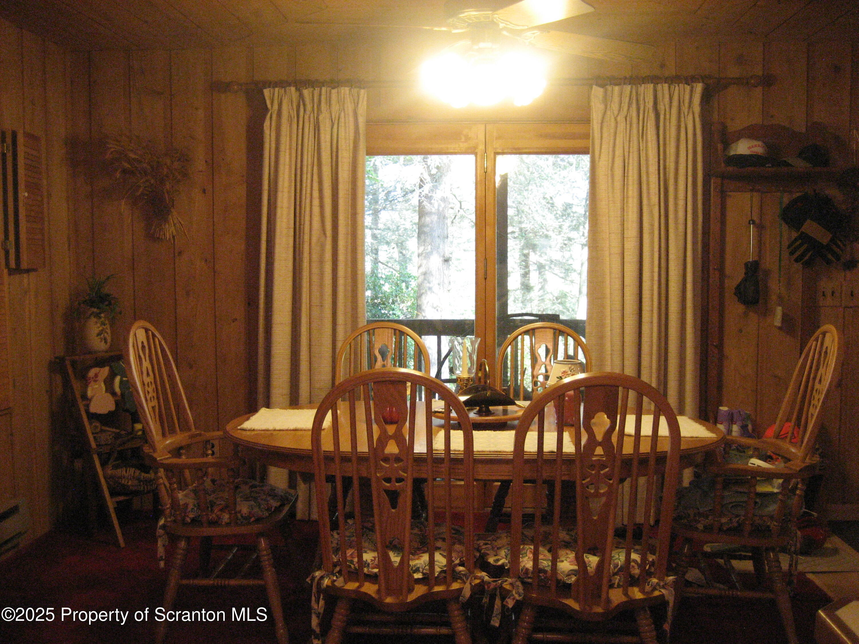 1526 Lakeview Road Susquehanna, PA 18847 - Photo 9 of 31 a view of a dining room with furniture window and outside view