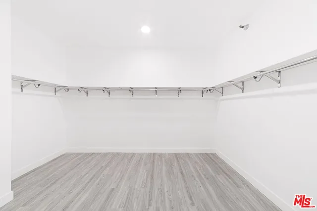 a view of a room with racks on the wall