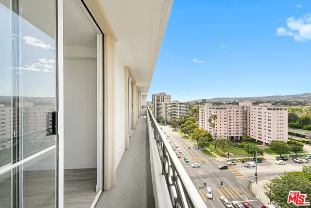 a view of a balcony with an ocean view