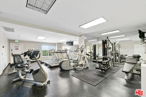 a view of a room with gym equipment