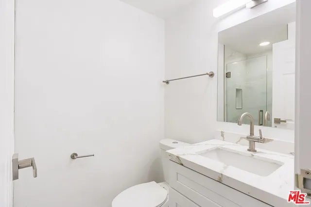 a bathroom with a sink and a toilet