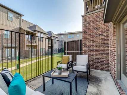 a building outdoor space with patio furniture