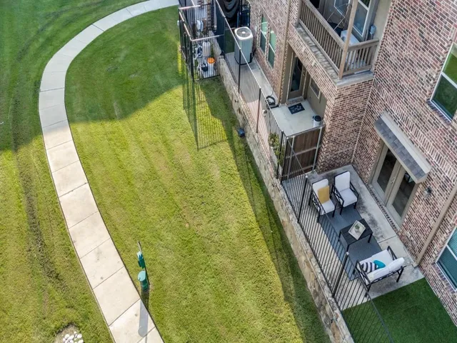 a balcony with view of swimming pool