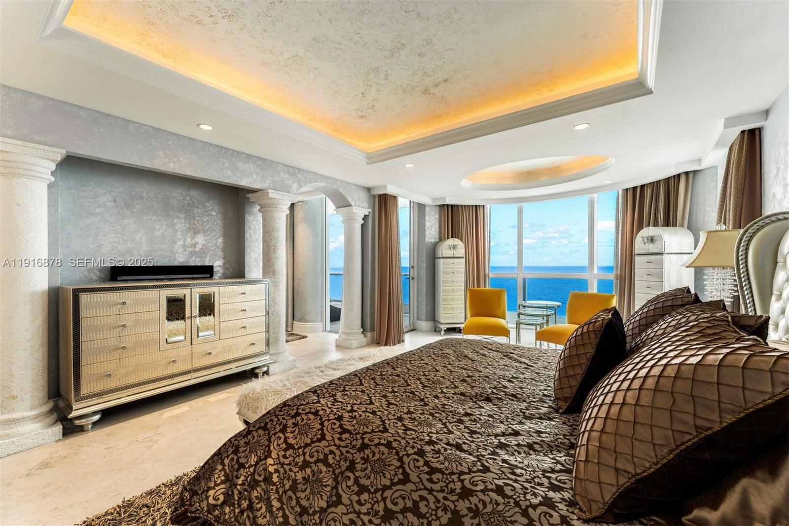 5025 Collins Avenue, Unit PH1 Miami Beach, FL 33140 - Photo 21 of 62 a bedroom with a bed and wooden floor