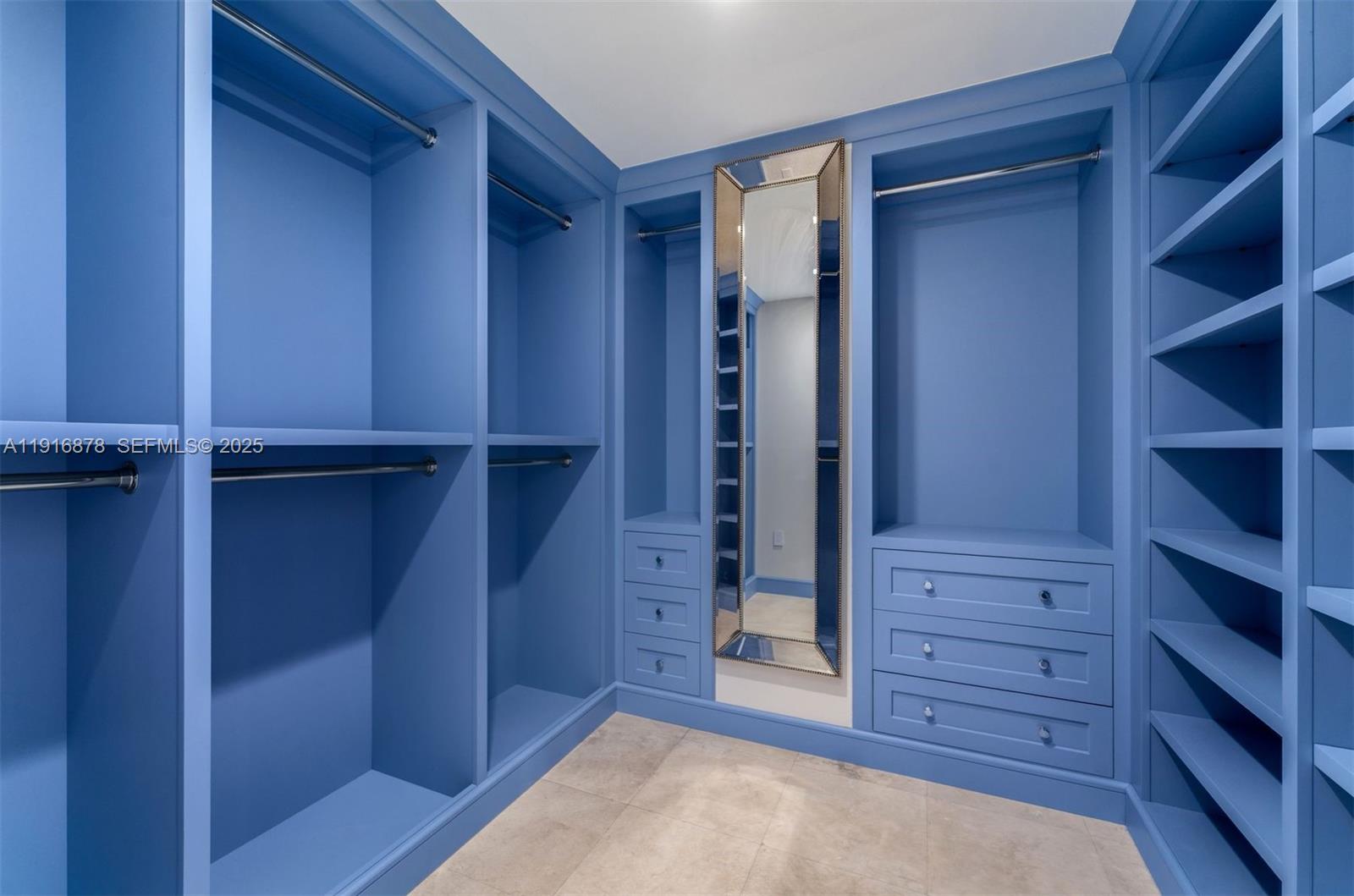 5025 Collins Avenue, Unit PH1 Miami Beach, FL 33140 - Photo 29 of 62 a view of an empty walk in closet