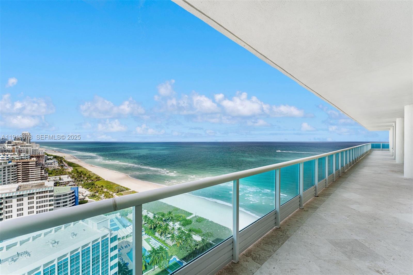 5025 Collins Avenue, Unit PH1 Miami Beach, FL 33140 - Photo 3 of 62 a view of swimming pool from a balcony