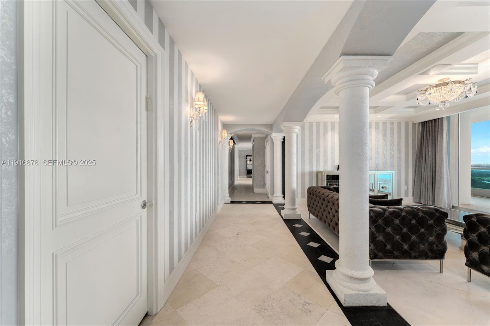 5025 Collins Avenue, Unit PH1 Miami Beach, FL 33140 - Photo 9 of 62 a view of hallway with walk in closet