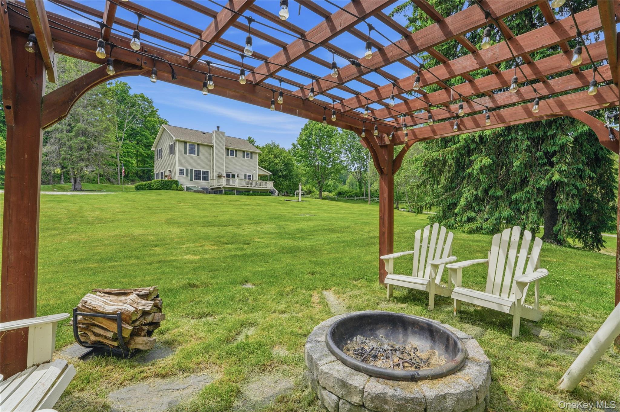 226 Cart Road, Unit C Dover Plains, NY 12522 - Photo 32 of 47 Pergola and firepit with home in background