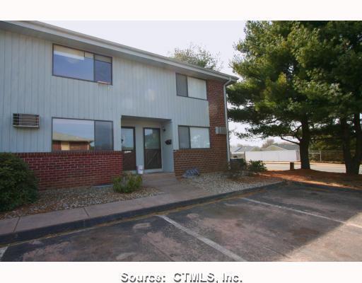 187 Homestead Street, Unit E2 Manchester, CT 06042 - Photo 1 of 1 a view of a house with a yard