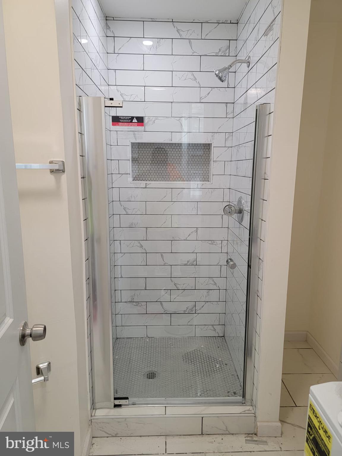 616 Tasker Street, Unit 2 Philadelphia, PA 19148 - Photo 12 of 22 a bathroom with a shower