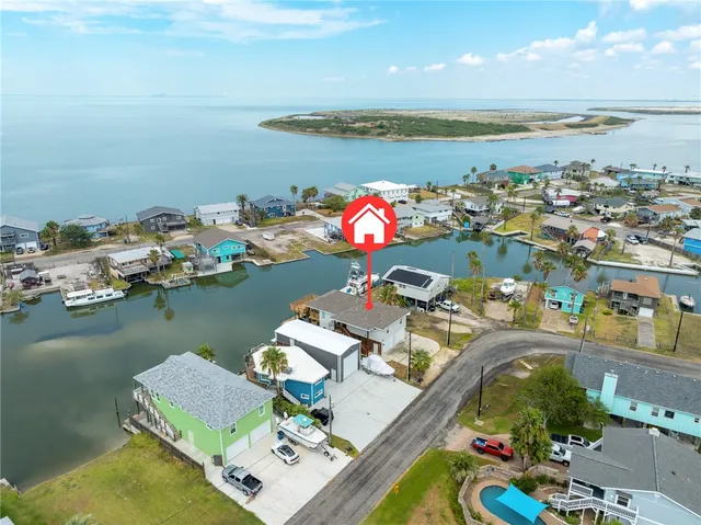 a view of a swimming pool and lounge chair