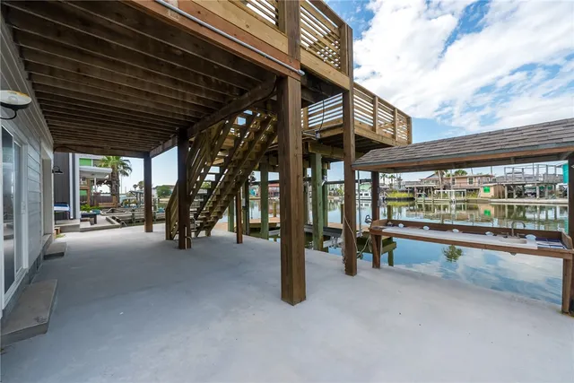 an aerial view of a house with a ocean view