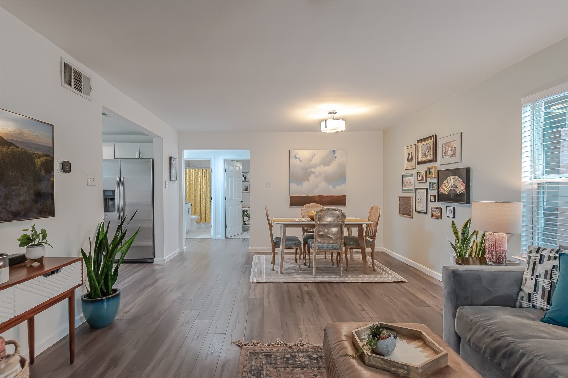 3604 Clawson Road, Unit 108 Austin, TX 78704 - Photo 1 of 1 a living room with furniture and a flat screen tv