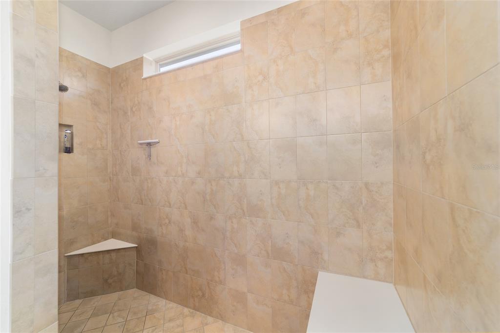 9603 Southwest 67th Street Ocala, FL 34481 - Photo 30 of 63 a bathroom with a shower