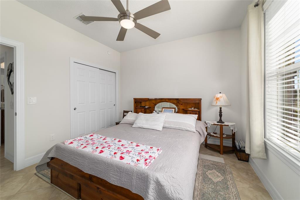 9603 Southwest 67th Street Ocala, FL 34481 - Photo 36 of 63 a bedroom with a bed and a window