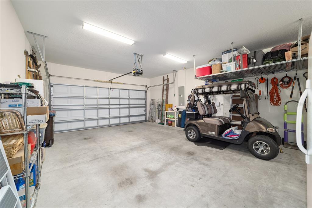 9603 Southwest 67th Street Ocala, FL 34481 - Photo 41 of 63 a view of parking garage with cars and other equipment