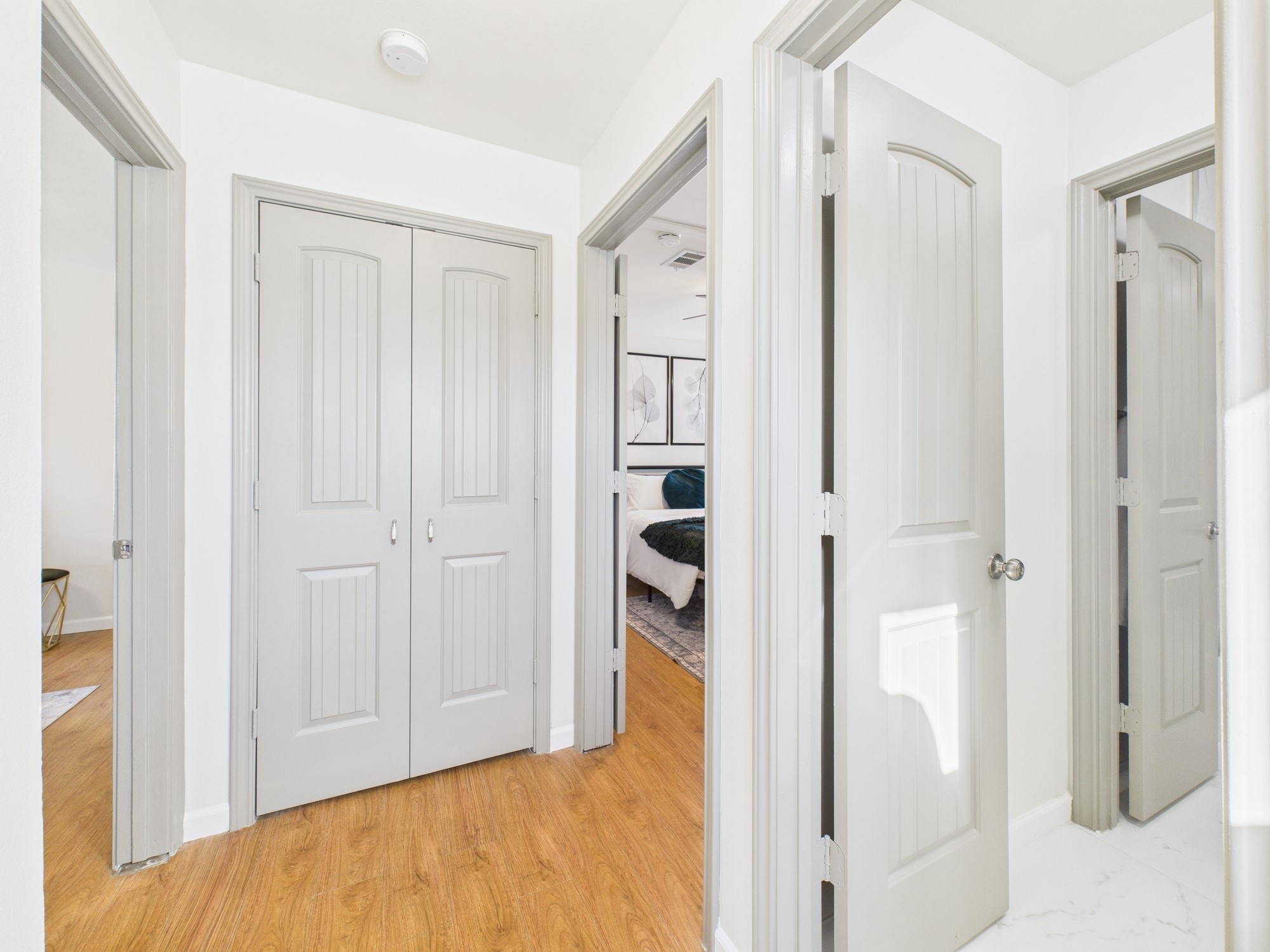 7836 Bateman Lane, Unit 7836 Houston, TX 77088 - Photo 26 of 44 Second Floor Landing with Linen Closet, Two Bedrooms and a Full Bath
