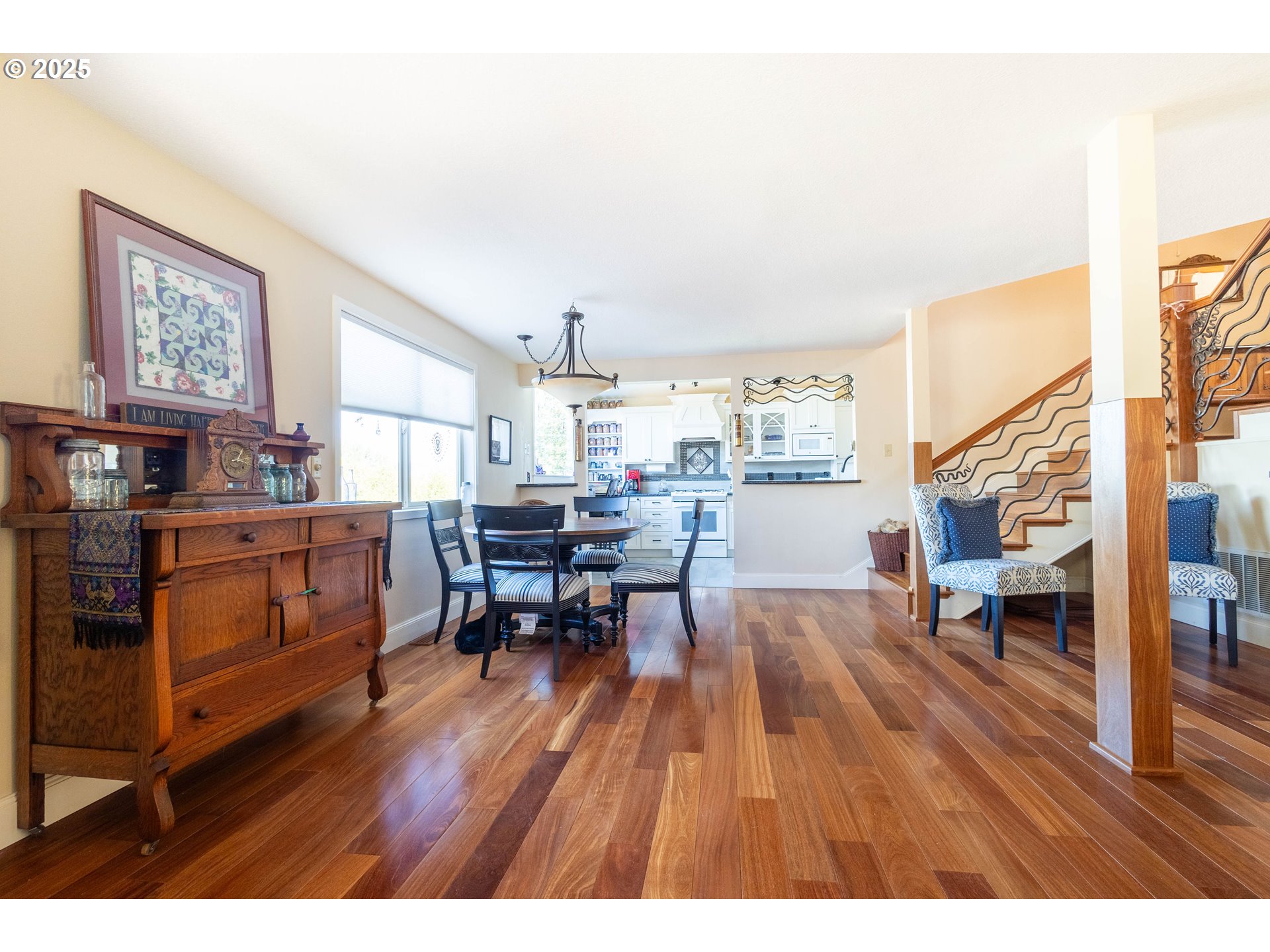 1902 Highland Drive La Grande, OR 97850 - Photo 15 of 46 a living room with furniture and a dining table with wooden floor