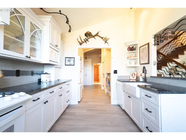 a view of hallway with washer and dryer