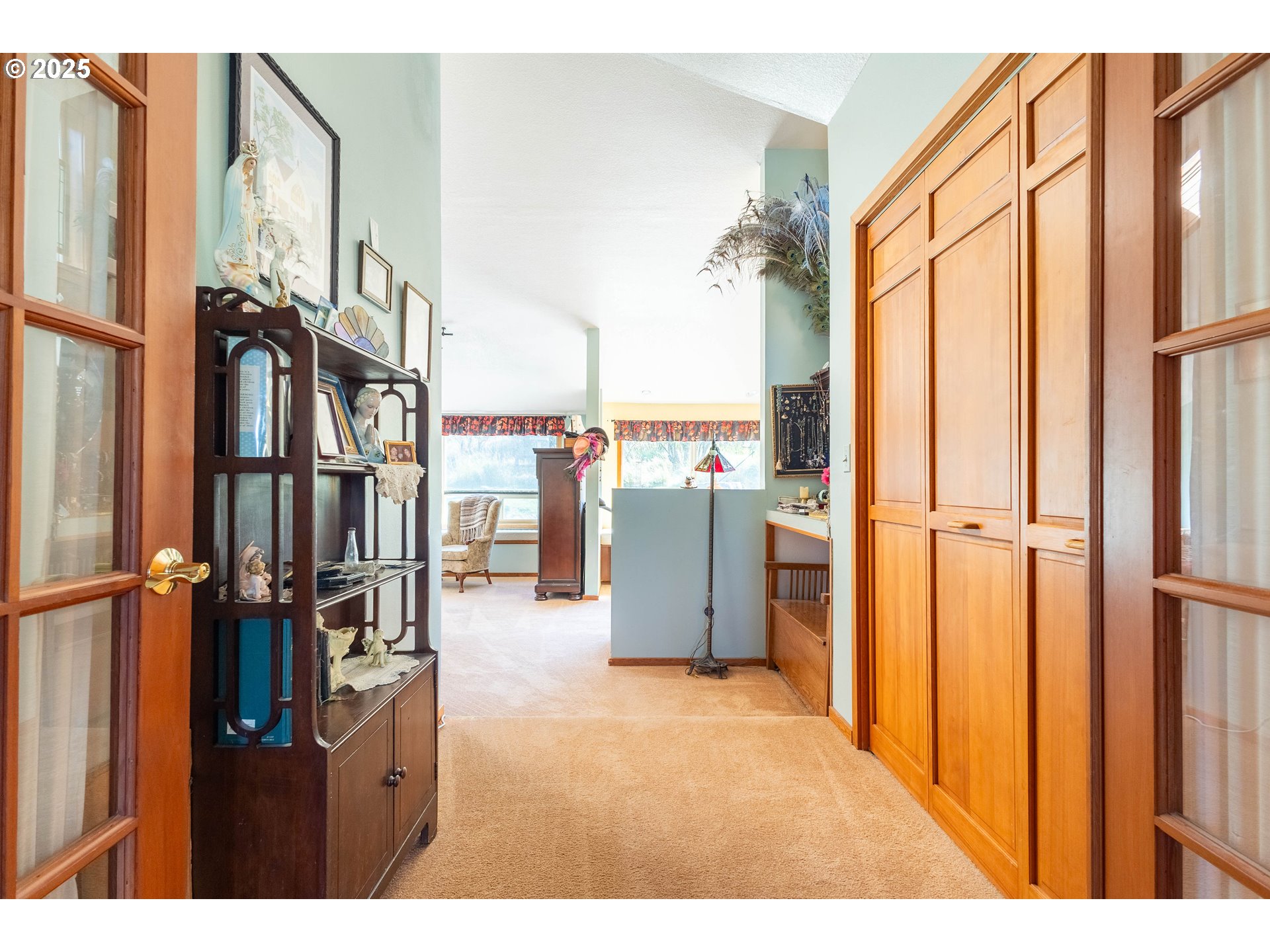1902 Highland Drive La Grande, OR 97850 - Photo 27 of 46 a view of living room with furniture and a refrigerator